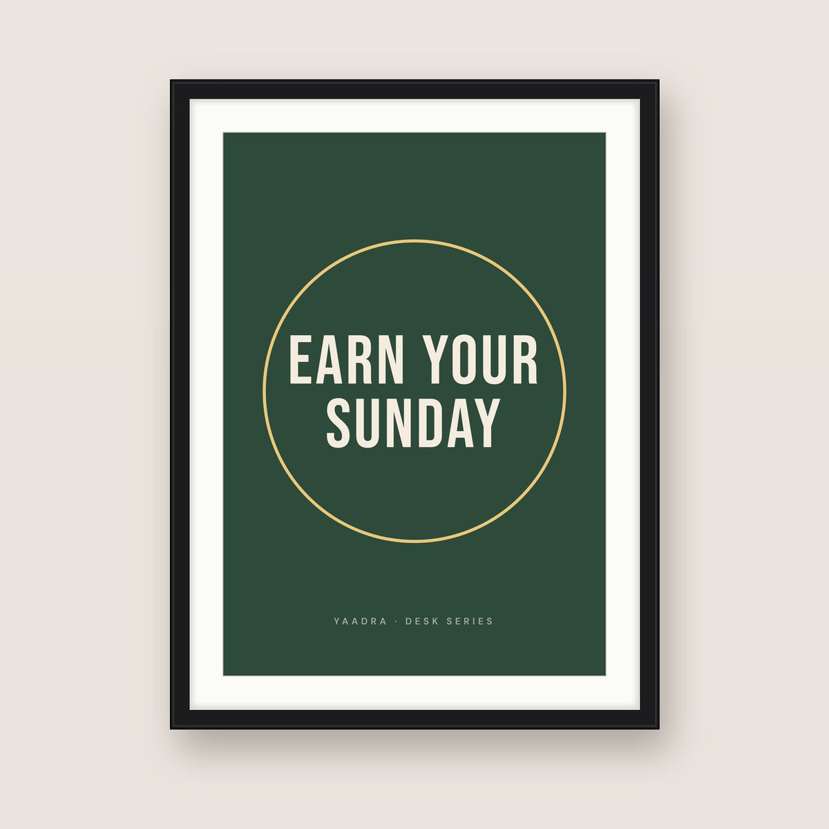 Earn Your Sunday in a black frame